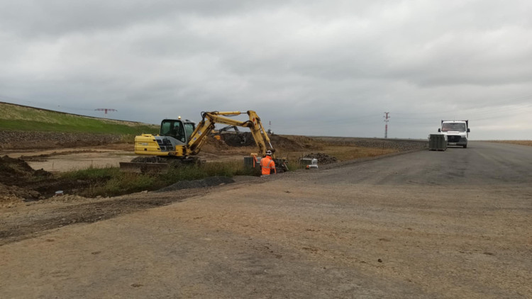 FOTOGALERIE: D1 okolo Přerova roste jako z vody