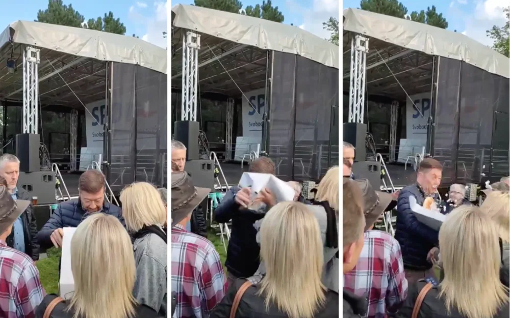 Žena chtěla na mítinku v Praze hodit Okamurovi do obličeje štrúdl. Zadržela ji policie.