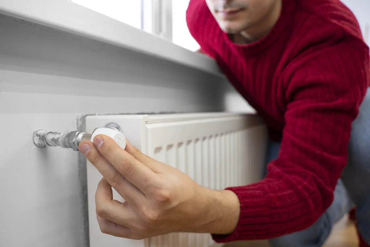 close-up-man-using-rotary-switch