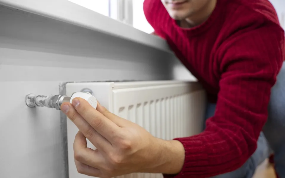 close-up-man-using-rotary-switch